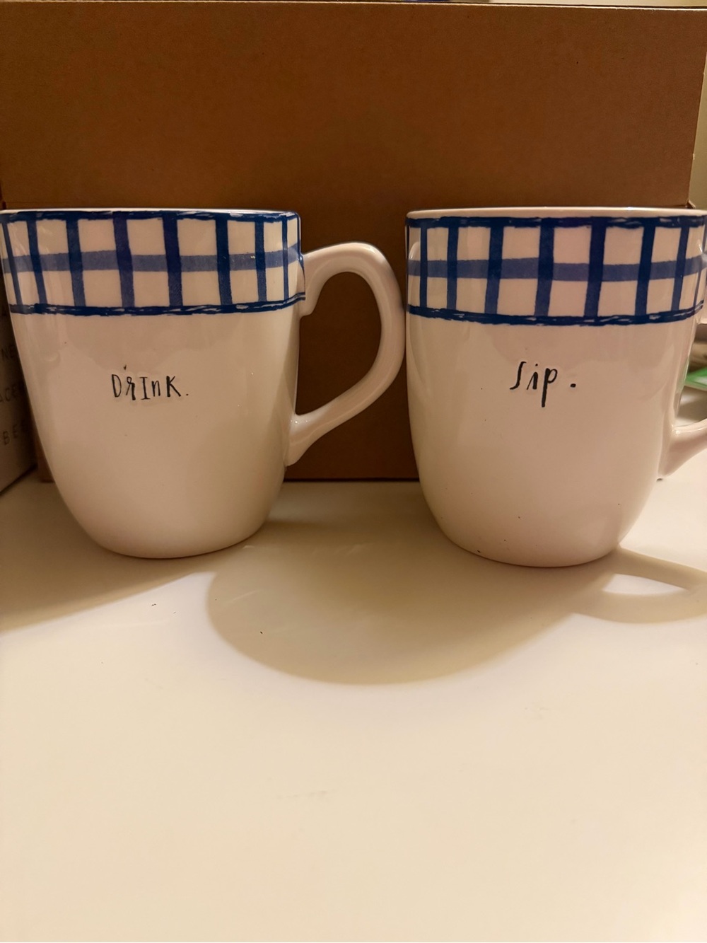 Rae Dunn White Ceramic Mug Set with Blue Check Rim - Drink & Sip